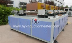 Railway tie plate induction heating