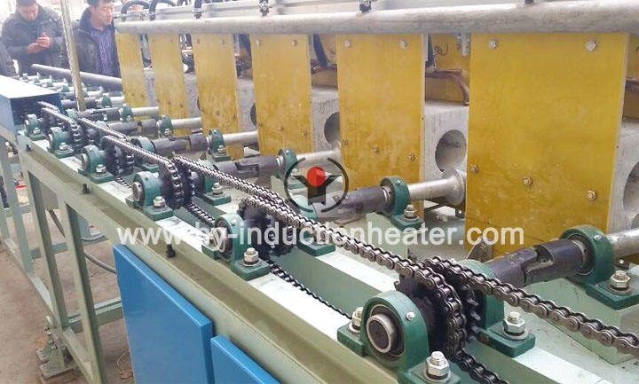 Induction heat treatment production line for round steel bars