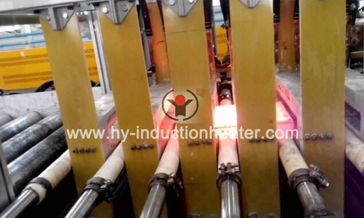 Induction slab heating system