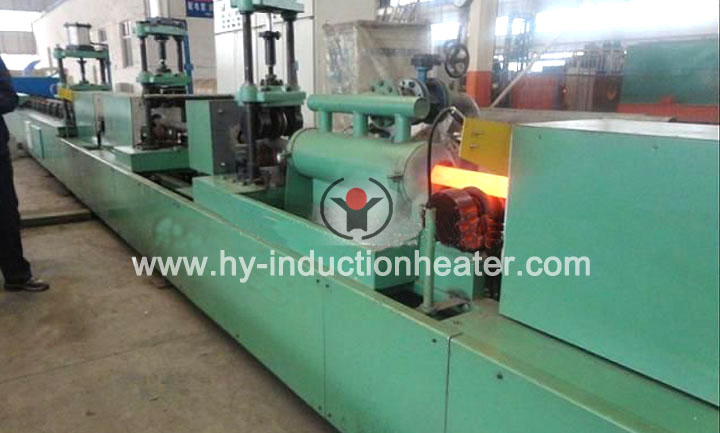 Induction tempering machine